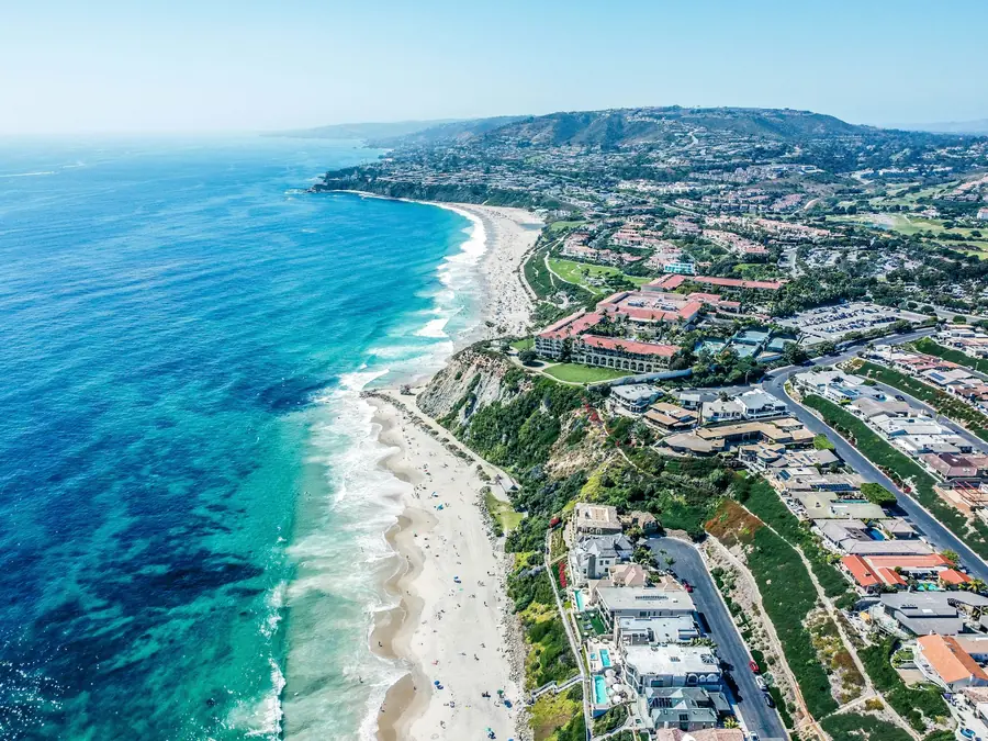 Aerial view of the Orange County coastline and hillside homes