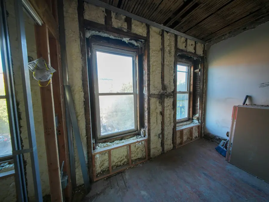 Room opened to the studs during structural drying